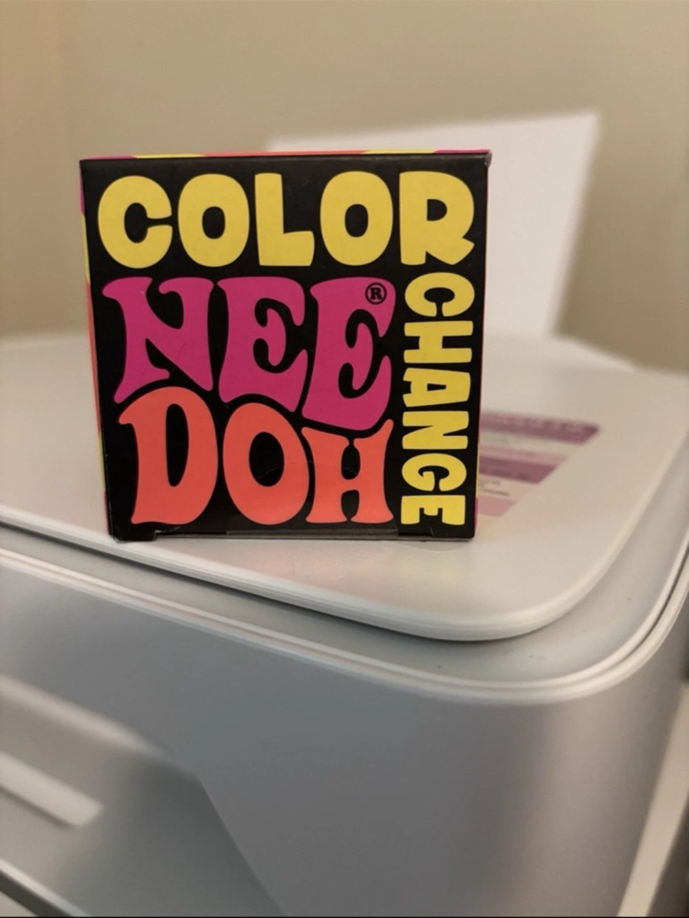 Needoh blue color change stress ball. Box is slightly torn on the top.